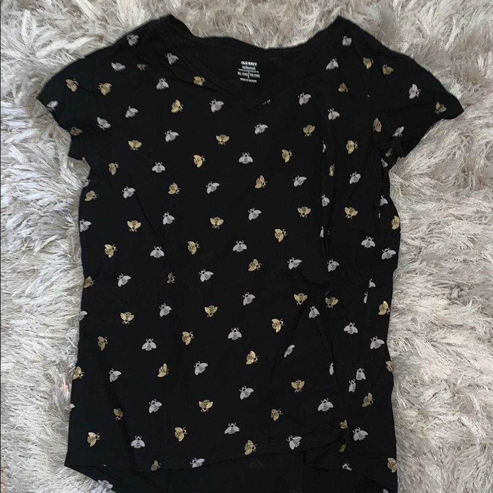 Black shirt with silver and gold bee designs